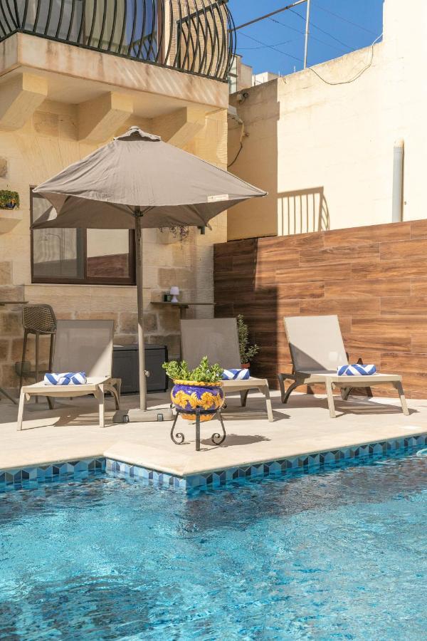 49 Sunrise Lodge Għajnsielem Esterno foto