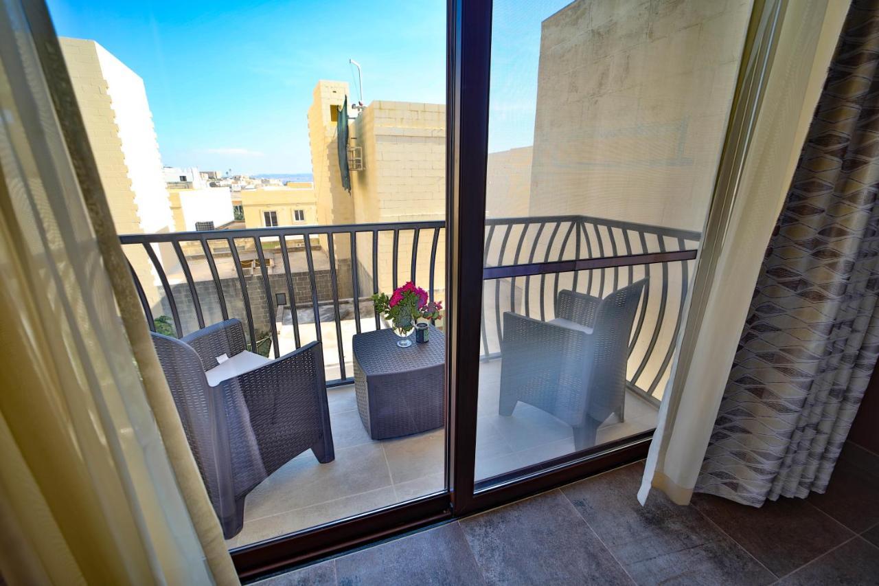 49 Sunrise Lodge Għajnsielem Esterno foto